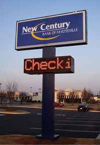 Large outdoor signage with a LED screen for New Century Bank of Fayetteville.