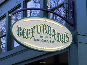 Outdoor hanging signage for Beef O'Brady's.