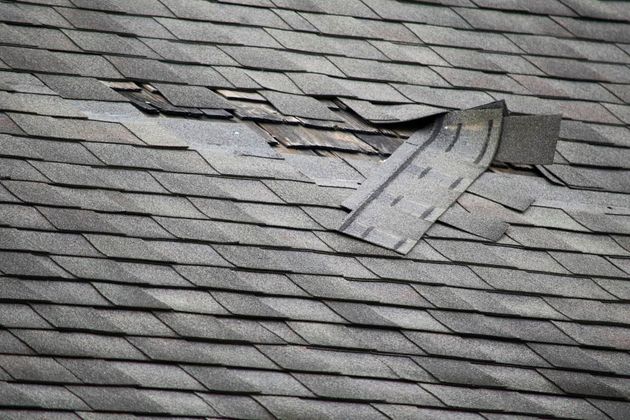 Damaged shingles on a roof