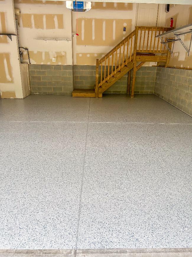 A garage floor with epoxy flooring.