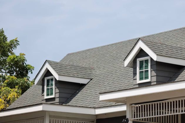 New asphalt shingle roof on a house