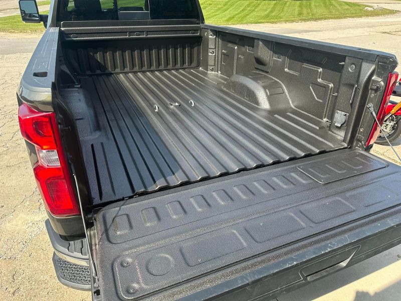 Black pickup with spray-on bedliner.