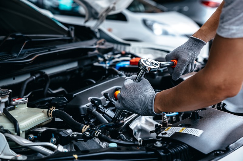 man working on engine