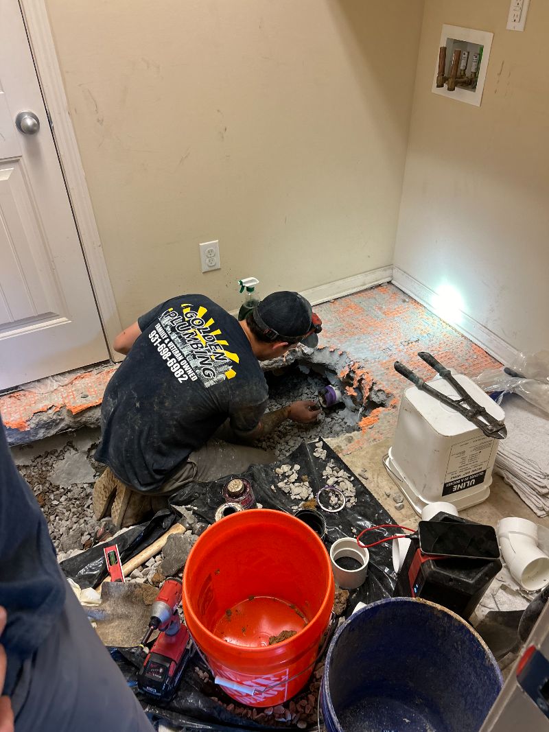 man putting flooring in 