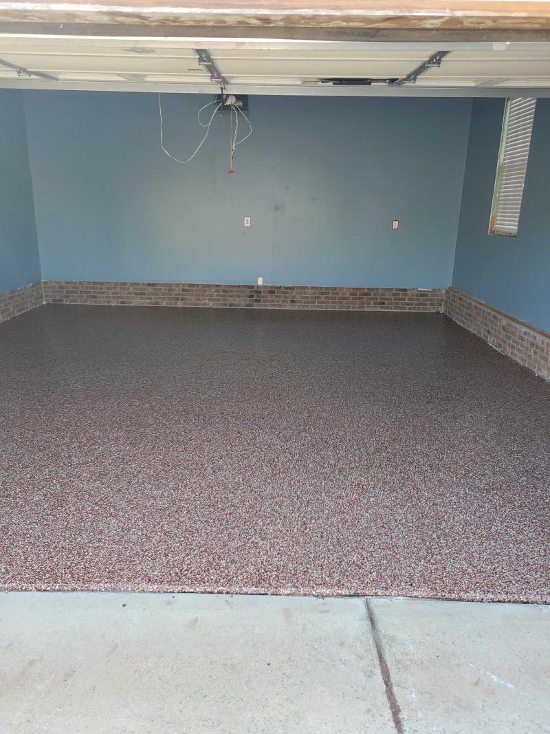 A garage floor with epoxy flooring.