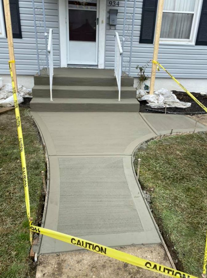 concrete walkway up to the door