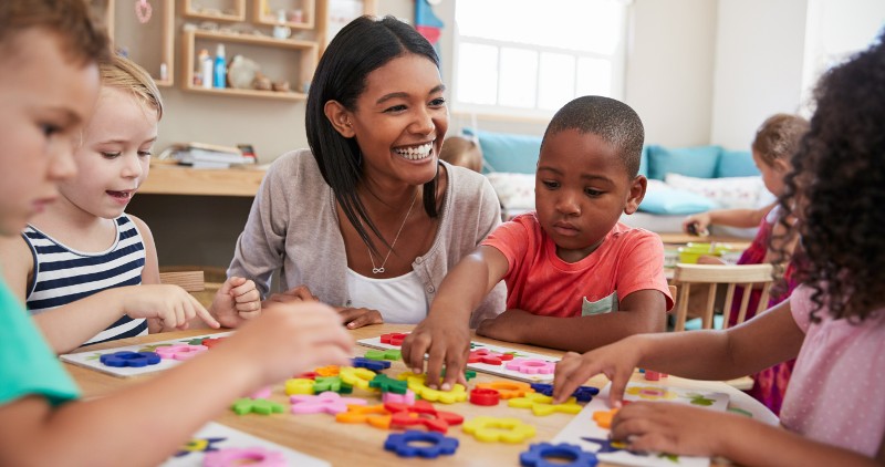 child care specialist with children