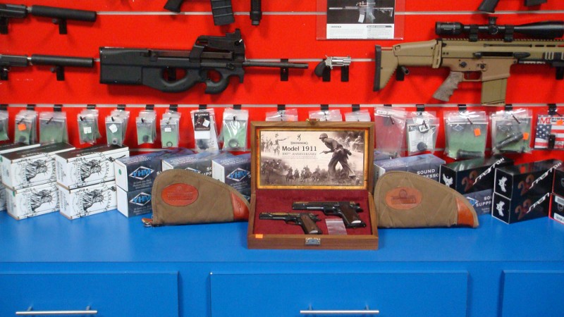 A display of specialty guns and accessories.