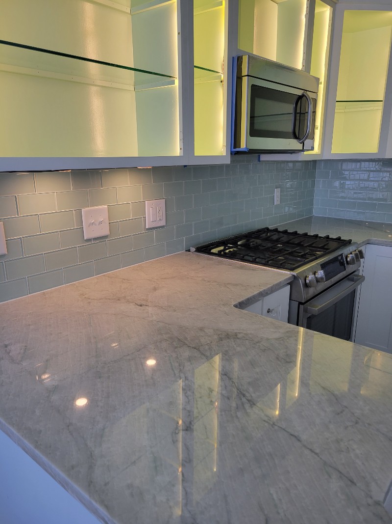 A kitchen with quartz countertops.