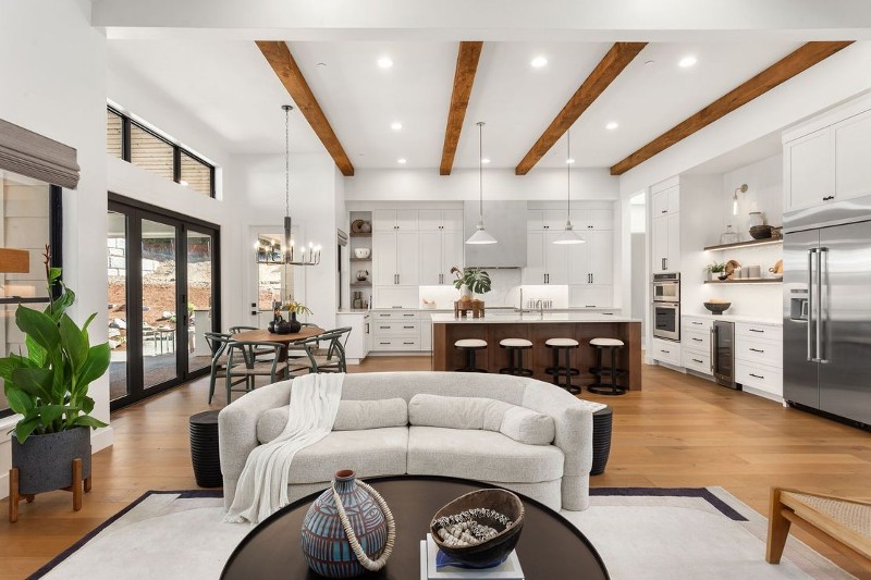 living room area with kitchen in the background