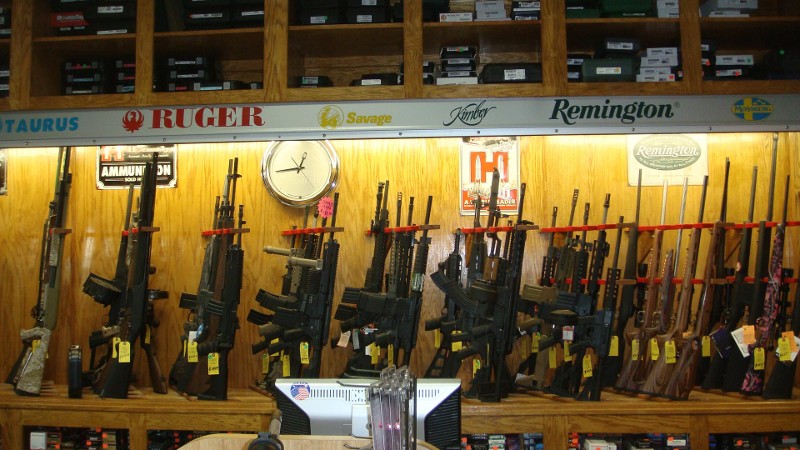 A display case of rifles.