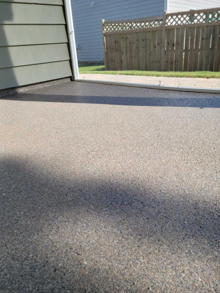 An outdoor patio with epoxy flooring.