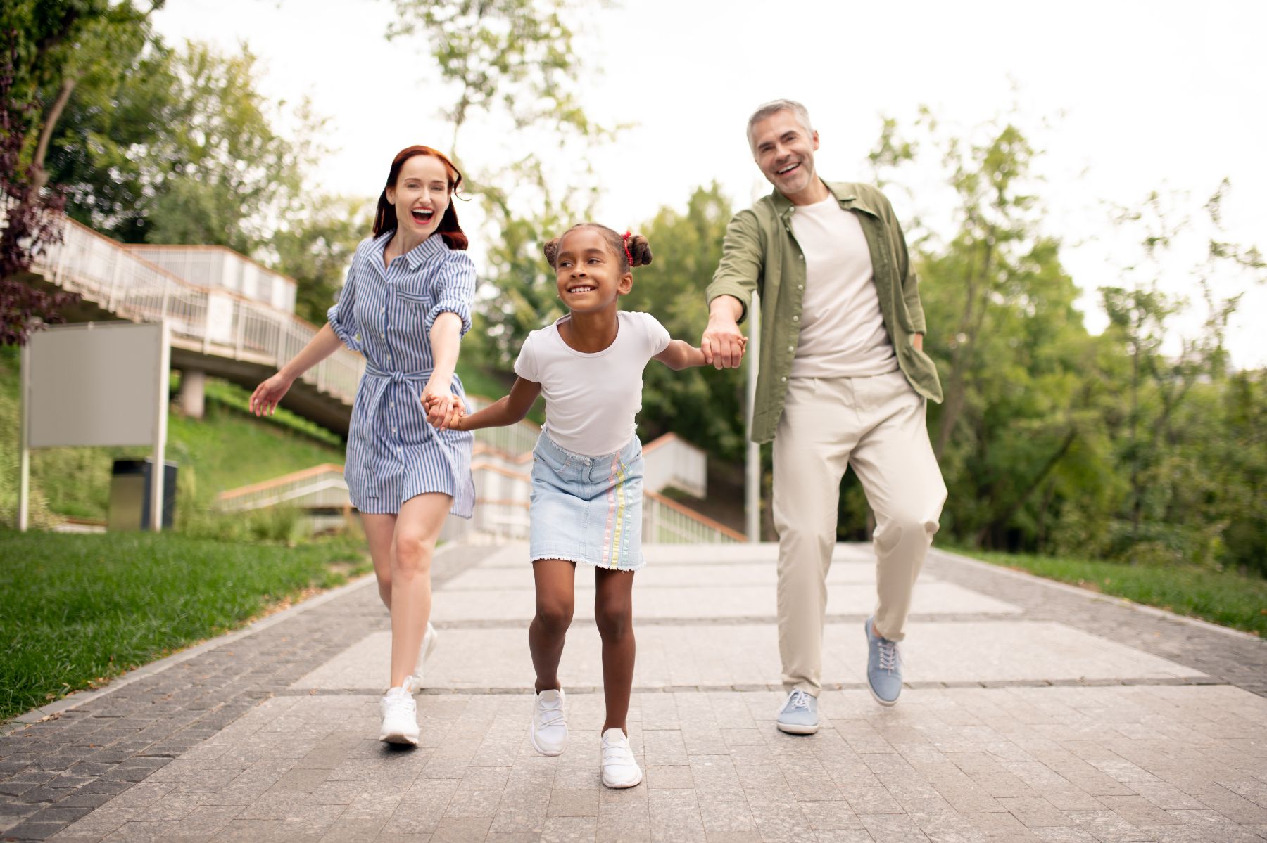 family walking down the street