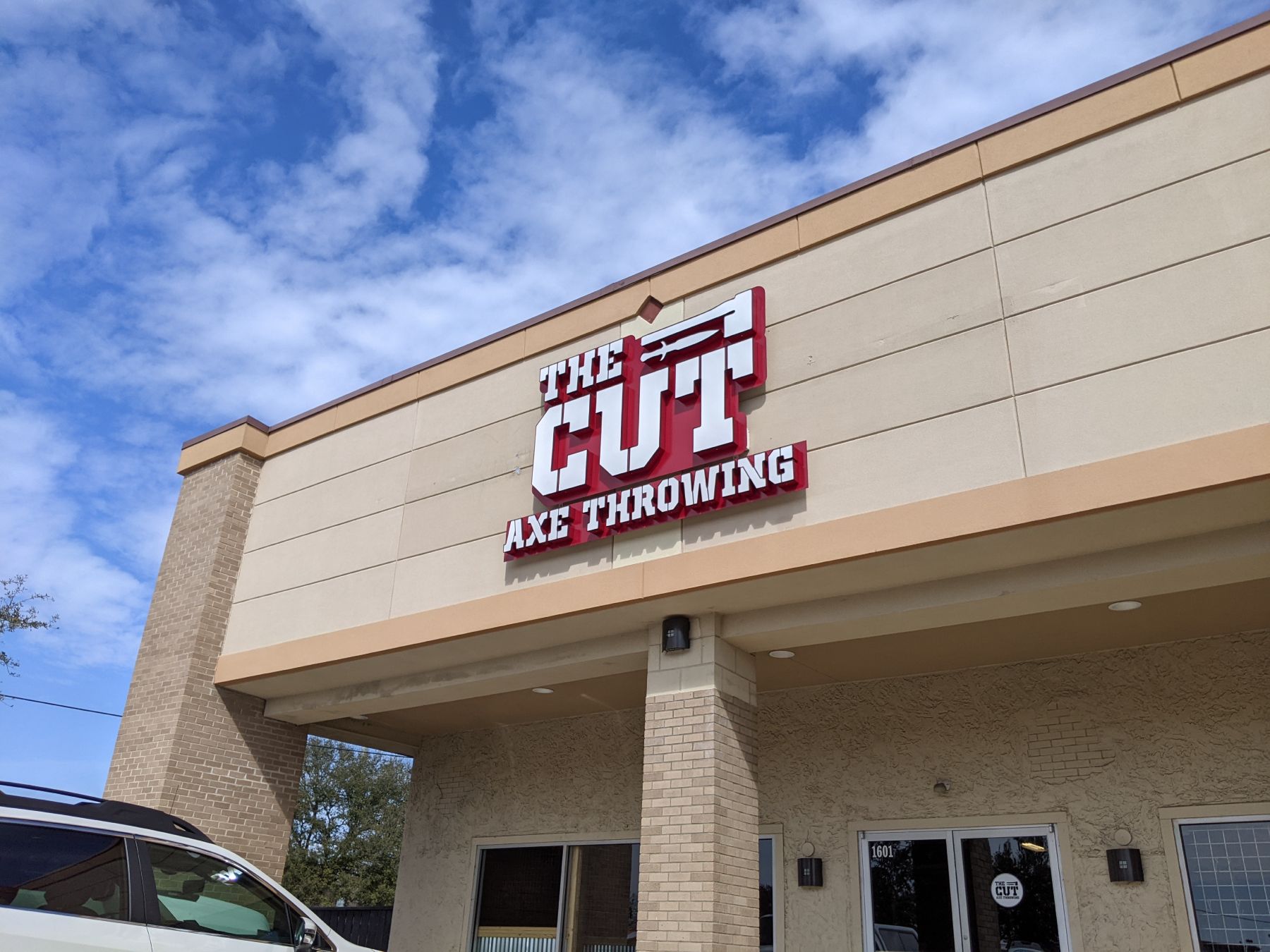 The Cut Axe Throwing signage