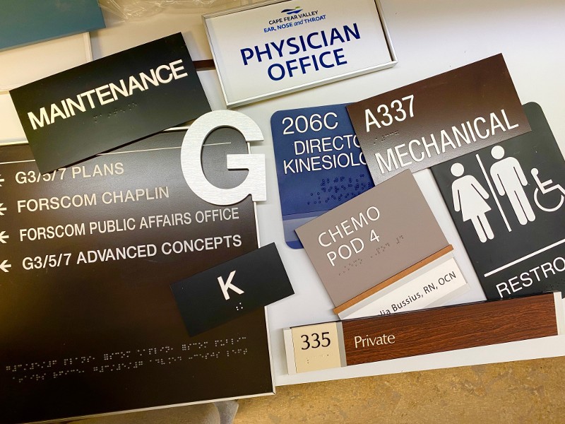 An interior sign for Exam Room 1.