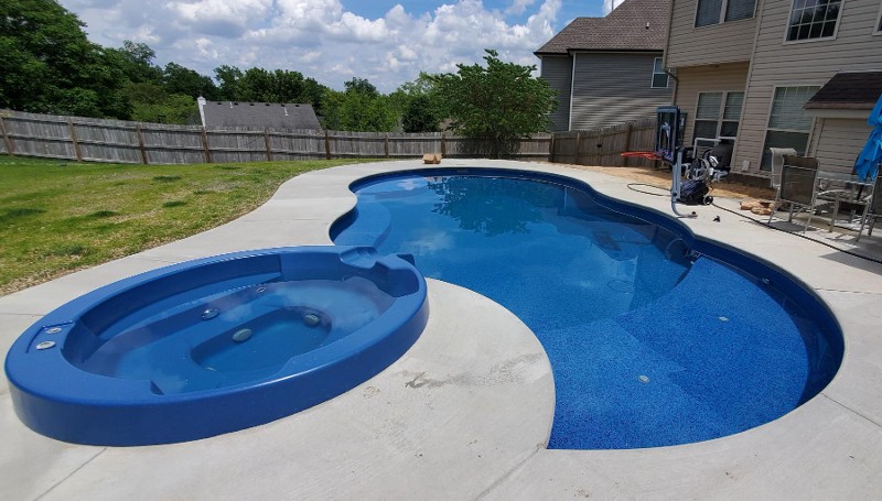 An overhead view of a backyard swimming pool