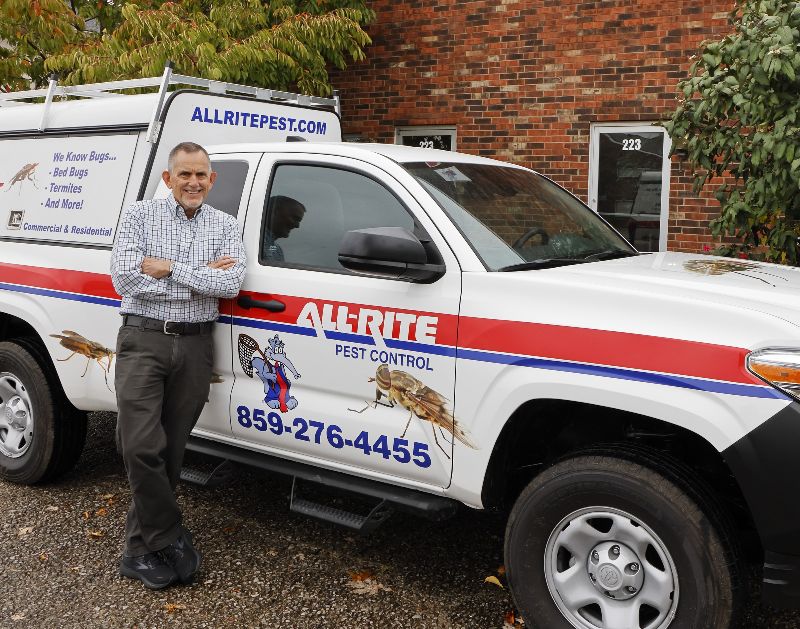 Tom Myers standing in front of a All-Rite business truck