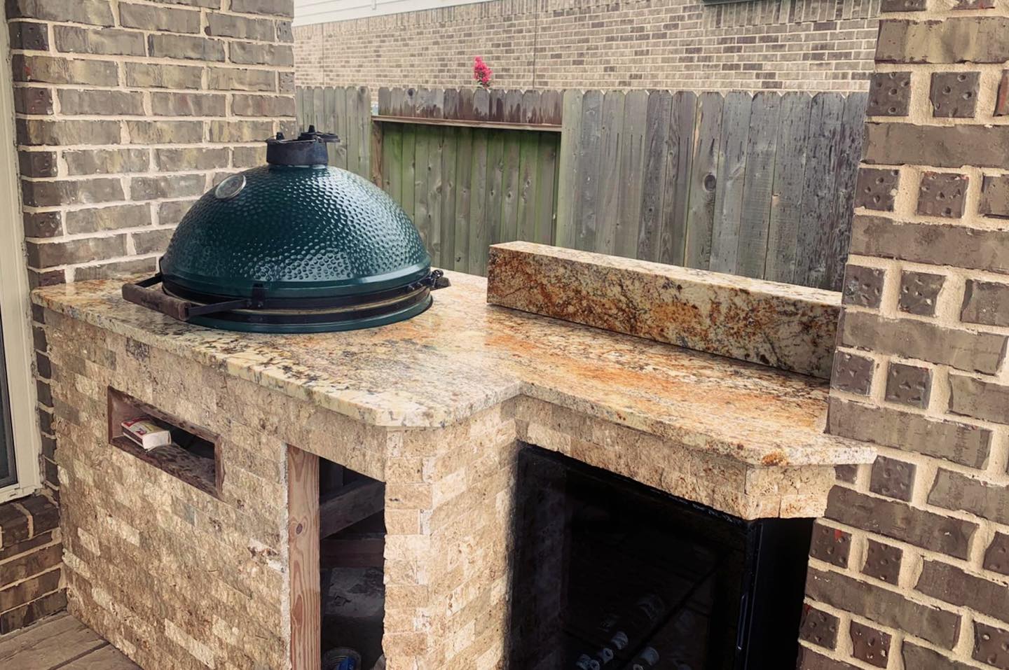 Outdoor kitchen with built in smoker / grill