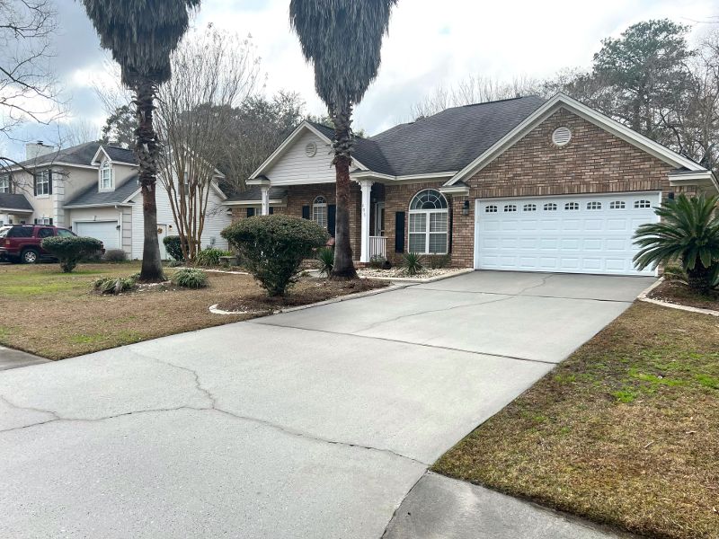 Another view of the same driveway following a pressure washing.