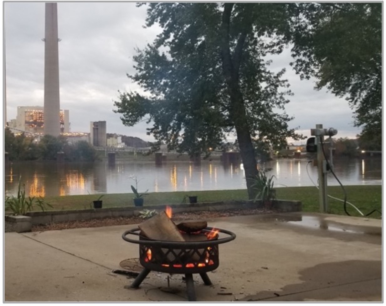 firepit in front of a lake