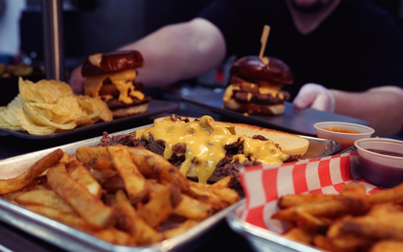 Plates of burgers, fries, and melts at Shipp Brothers Brewing.