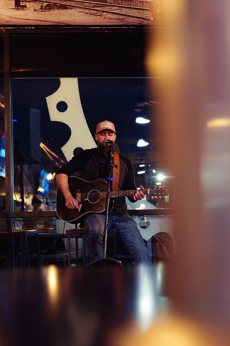 Live musician performing at Shipp Brothers Brewing