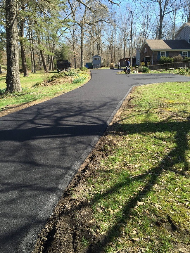 An asphalt driveway.