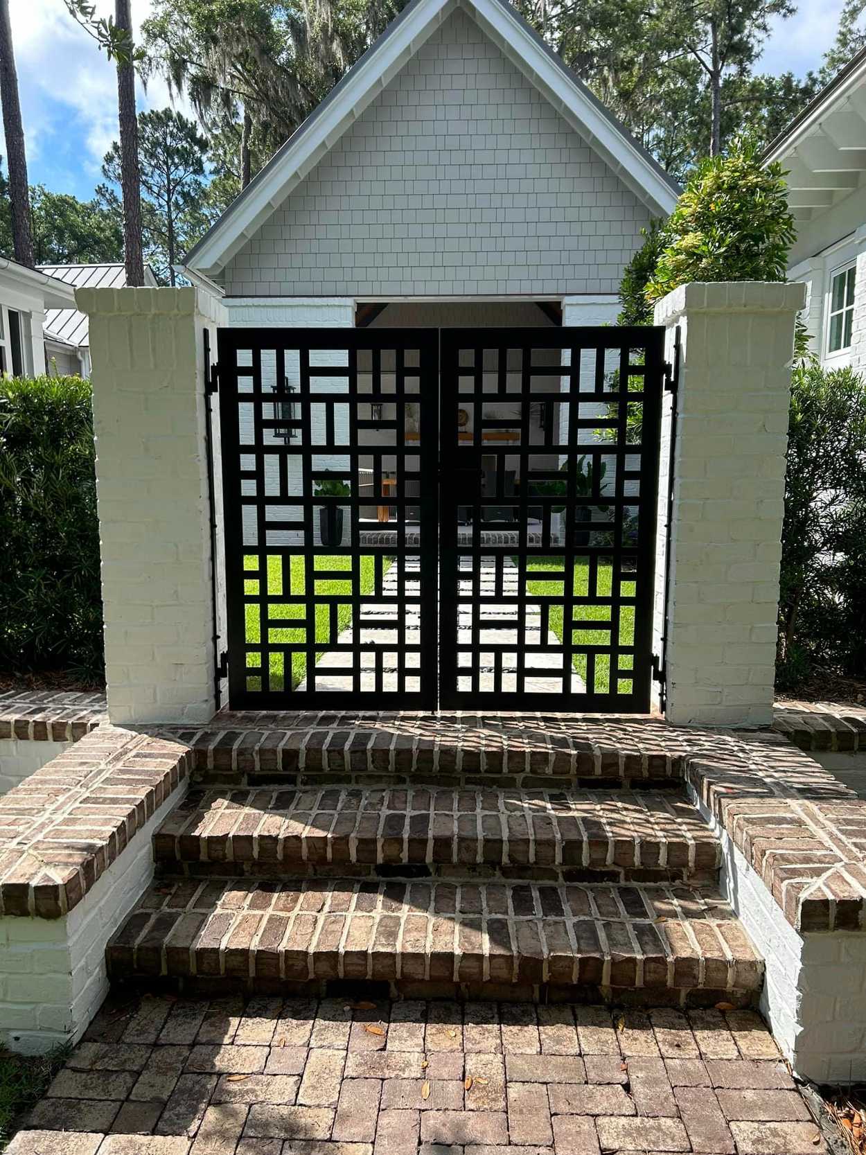 Entrance with iron railing.