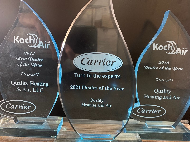 3 award trophies for Dealer of the Year