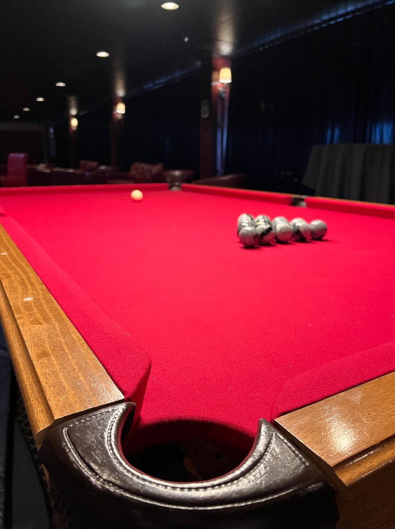 A red velvet pool table