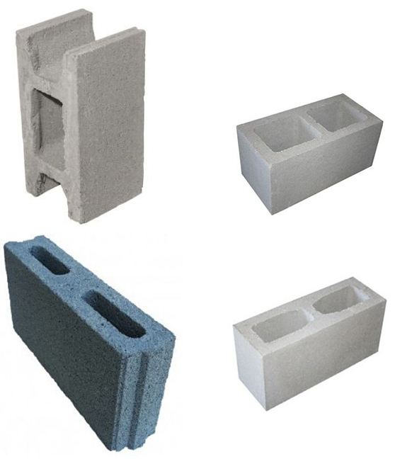 Four cement blocks of different sizes and colors
