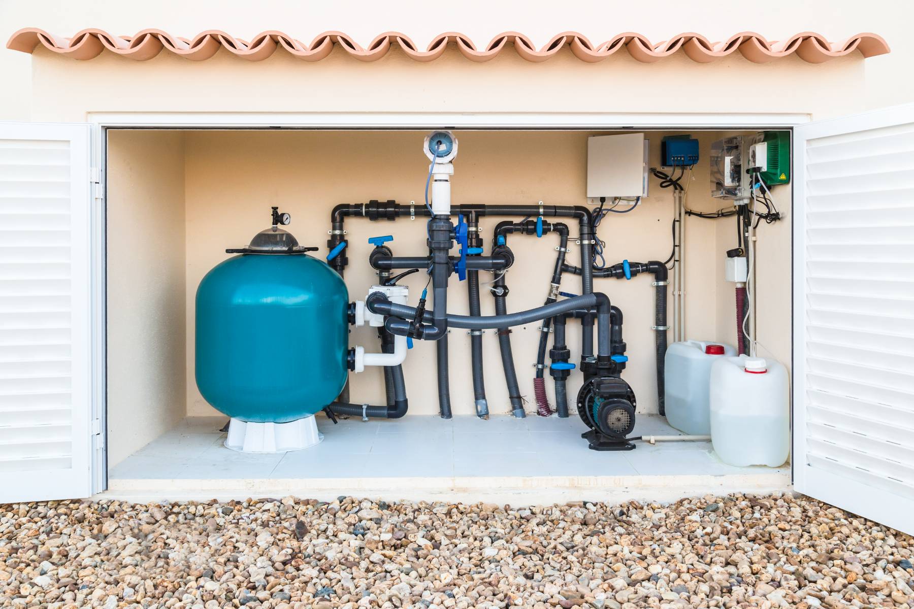 A swimming pool pump system housed in a decorative box