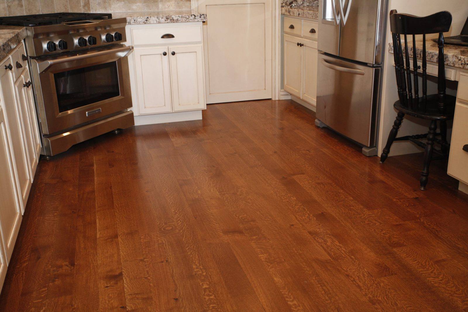 Rich cherry hardwood in a kitchen.