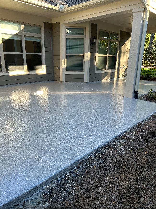 An outdoor patio with epoxy flooring.