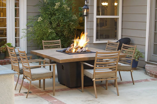 An outdoor seating area with a fire pit.