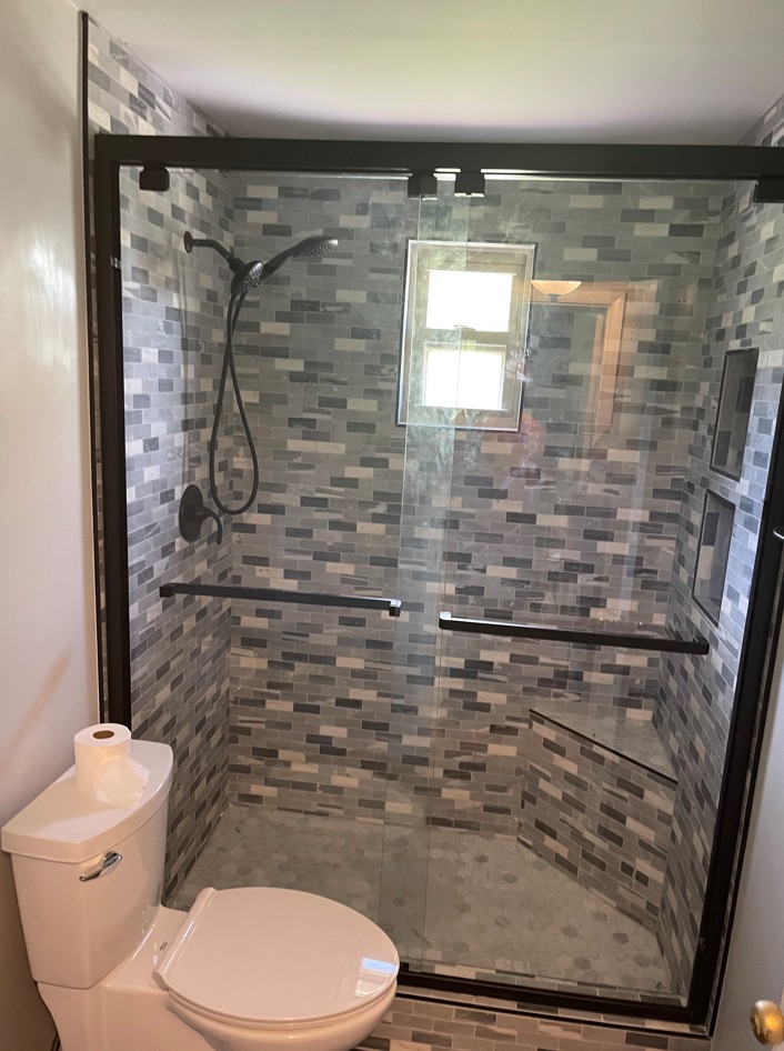 Newly installed shower with glass doors