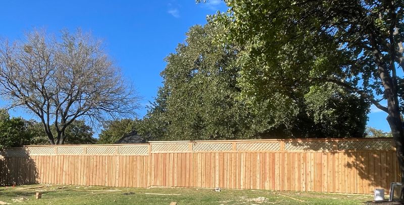 Wooden fence with lattice top