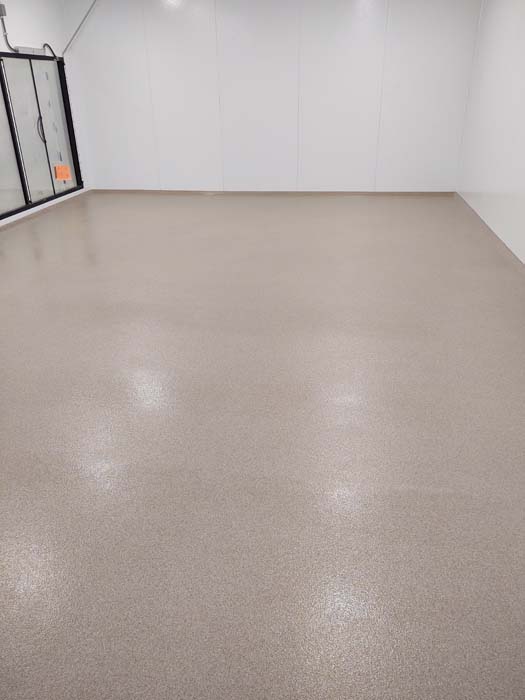 A garage floor with epoxy flooring.