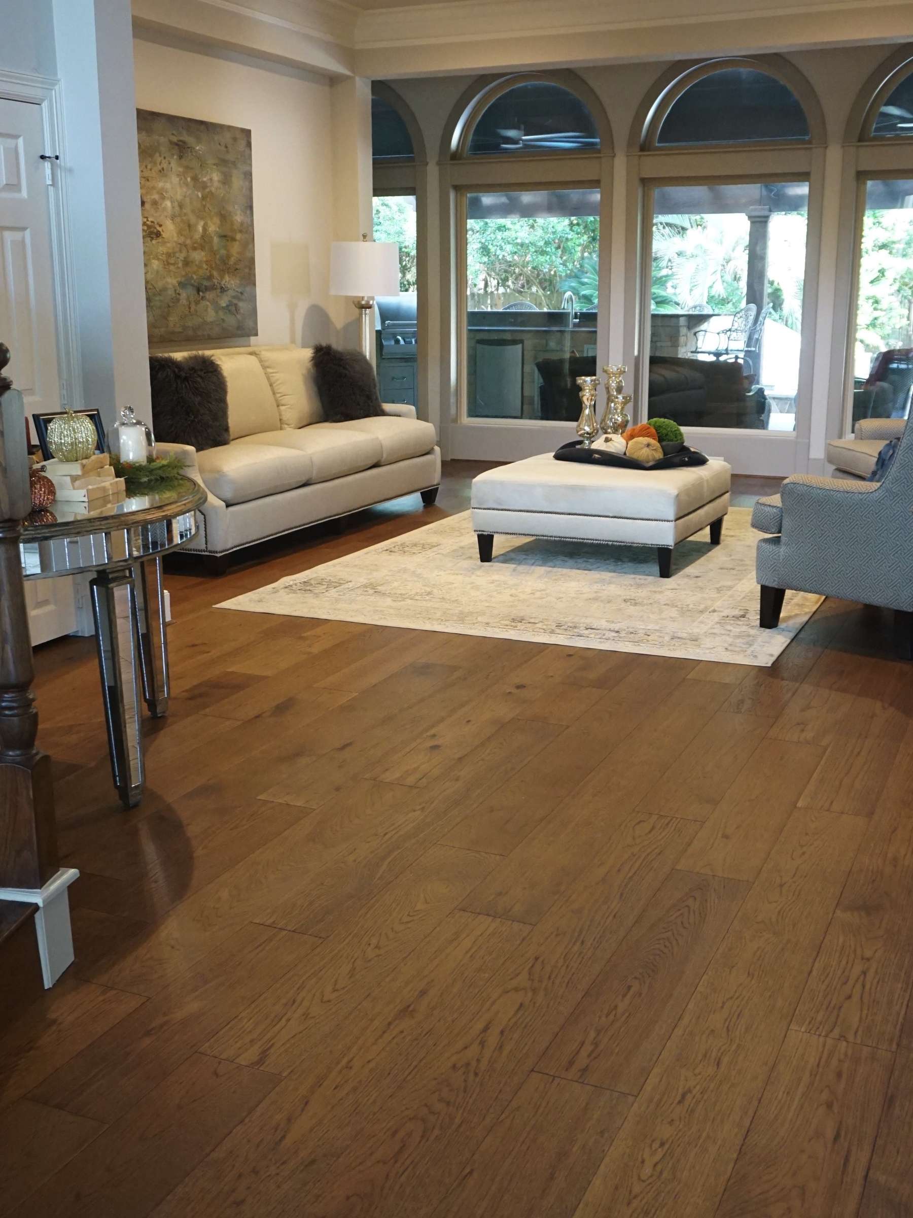 A living room scene sports the rich look of handsome hardwood.