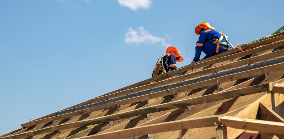 men working on a roof