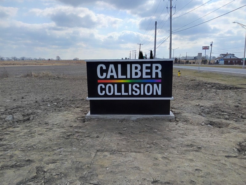 Caliber Collision sign