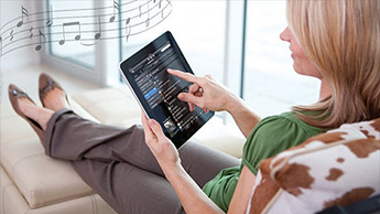 Woman looking at a tablet device.