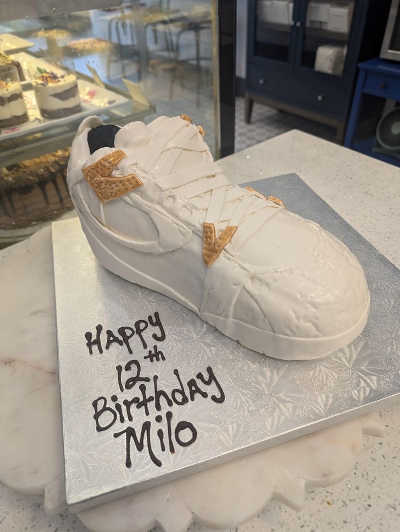 decorated birthday cake shaped like a shoe