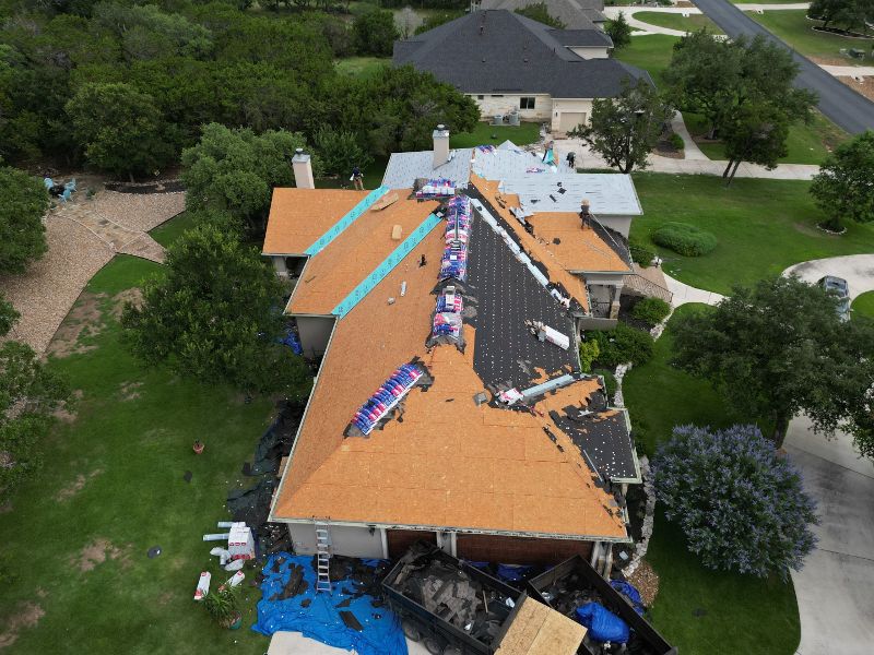 The overhead view of a new roof being installed on the roof of a home.