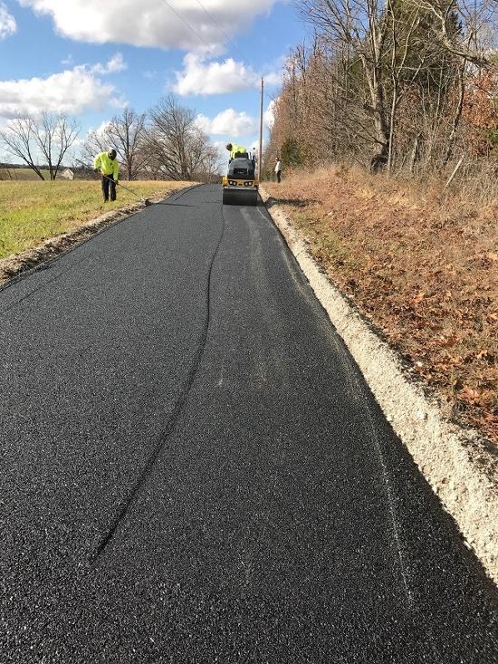 A newly laid asphalt path.