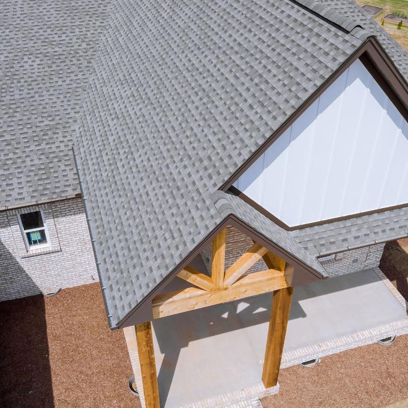 aerial viewing of a residential home with a new roof