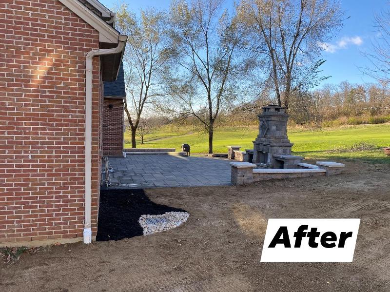 after photo of landscaping service behind a house