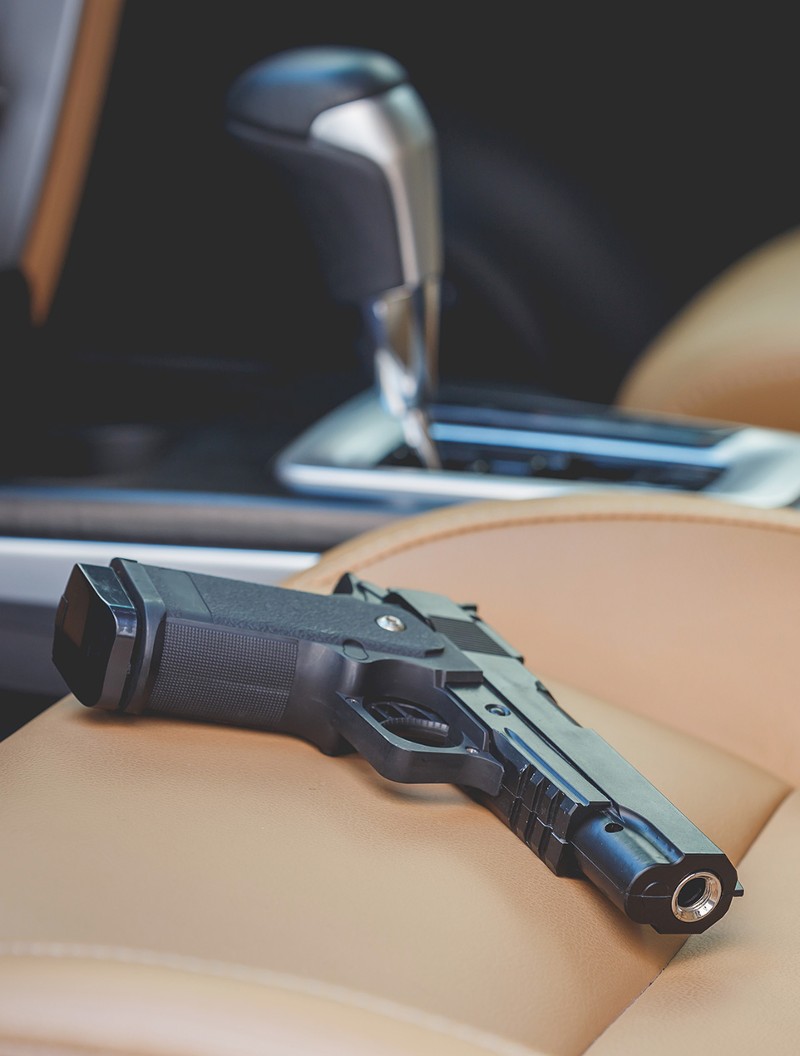 gun on the seat of a car