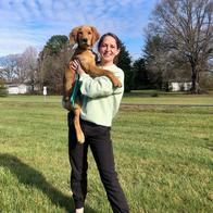 Tiffany Bodsford posing with one dog.